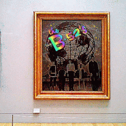an artwork hangs in a museum display on the wall