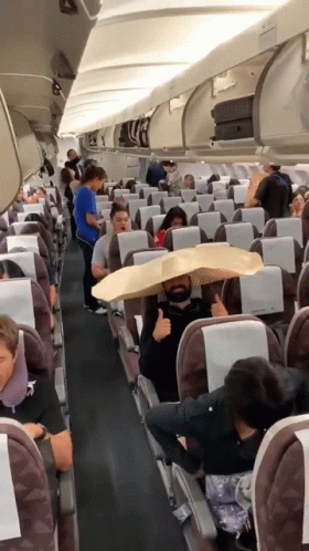 airplane with some people inside of it that are sleeping