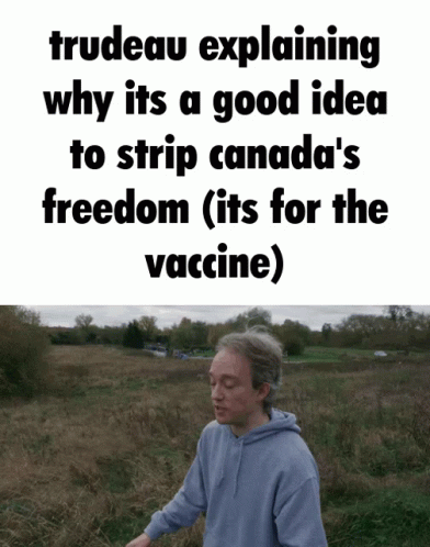 a man standing in a field with a sign that reads, trueau explaining why its good idea to strip canada's freedom fits for the vocaine