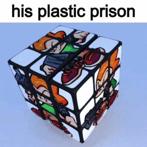 a rubik cube has a man playing inside