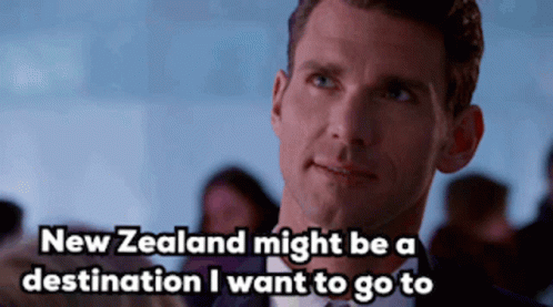 a man in an event with a quote about new zealand might be a destination i want to go