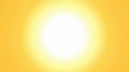 bright sunlight appears to be in blue sky, with bright white circle below