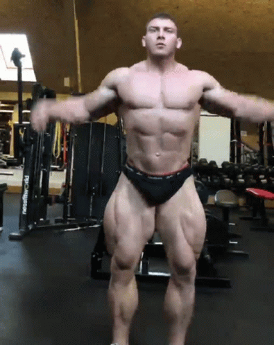 an animated male with  standing in the gym