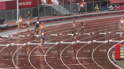 athletes racing around a track on interactive platform