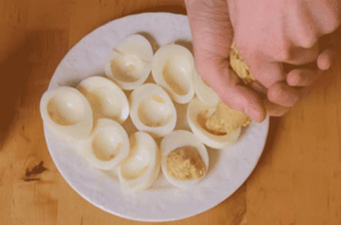 a plate full of little white egg shells