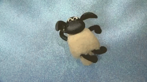 a stuffed animal on a carpet in a room