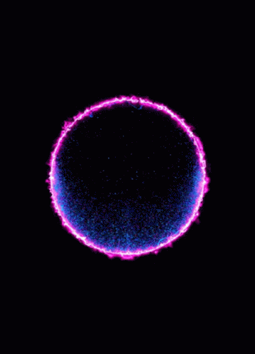 a very bright purple circular shaped object with many dots of light