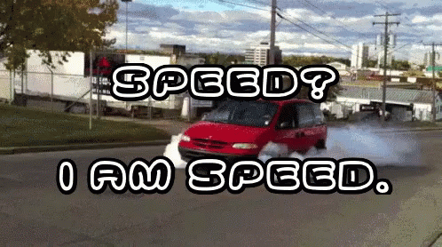 the truck on the street is turning the corner and it has words reading, speed i am speed