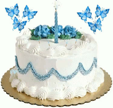 a white cake topped with a tall frosted birthday cake