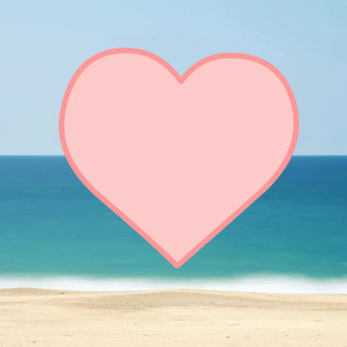 there is a heart that is on the beach
