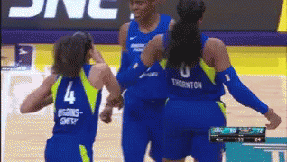 the two women basketball players are wearing their uniforms