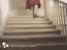 a set of stairs going down to some sort of door