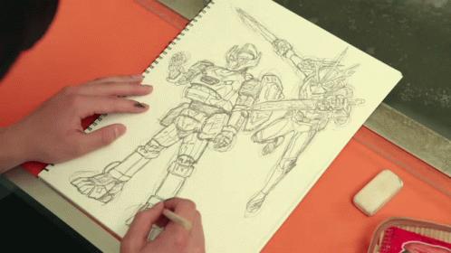 person drawing a coloring page in black ink