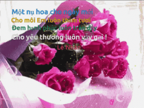 a bouquet of purple roses are displayed in a purple vase