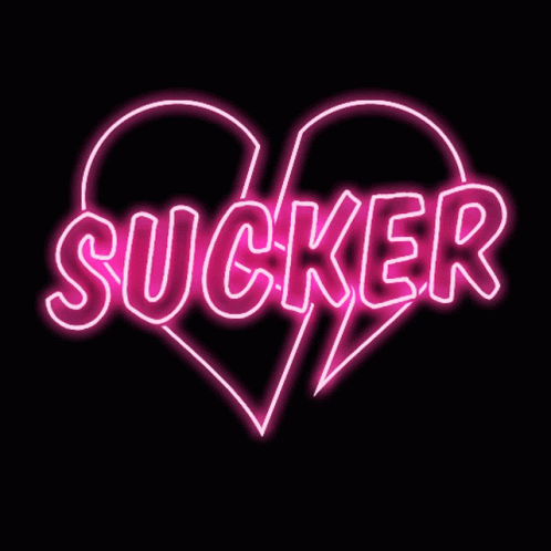 a neon text with the word sucker over it