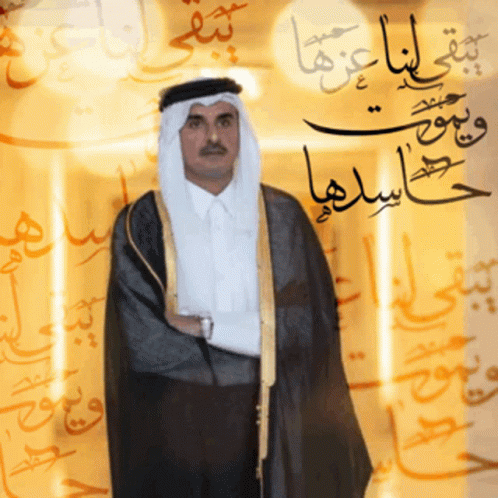 a man in costume with arabic writing