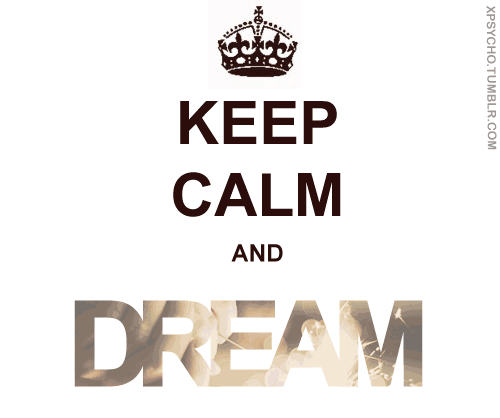 a poster with the words dream written in white and blue