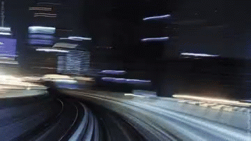 an abstract motion blurred picture of a train moving