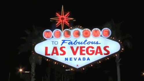 the las vegas sign at night time