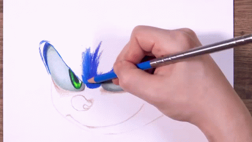 a person is drawing an image with colored paint