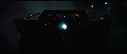 the car in the dark with its lights on