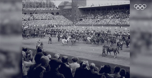 an old po of men on horses at a sporting event