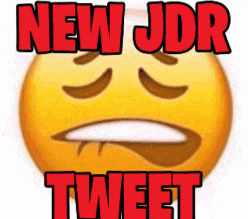 a very angry looking blue smiley face with new jdr on the nose