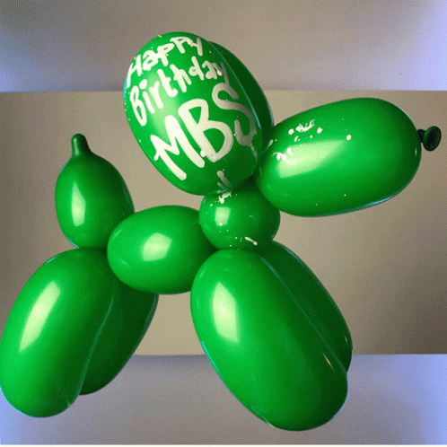 a balloon like dog has some balloons around it