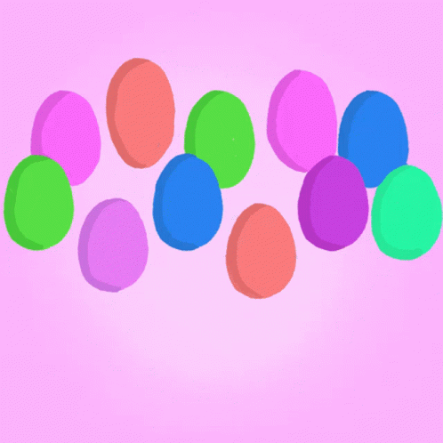 multicolored objects placed on pink background