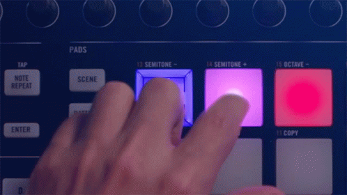 a hand is clicking on ons in a control board
