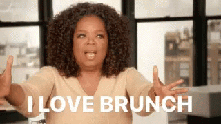 a woman is showing a message that says i love brunch