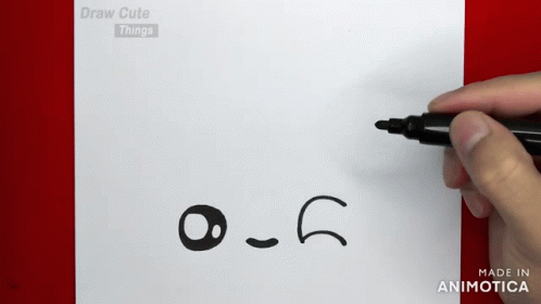 a hand drawn smile faces on a piece of paper