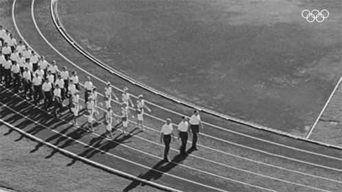 the athletes have a long line of men standing in formation