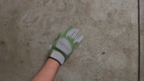 a blue hand with a green palm pointing towards soing