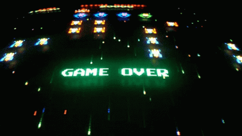 the game over light show with cars passing by at night