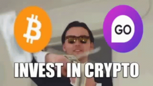 the video is showing a woman in shades and with two bitcoins