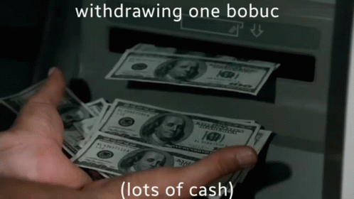 a cash machine with two hundred dollars coming out of it