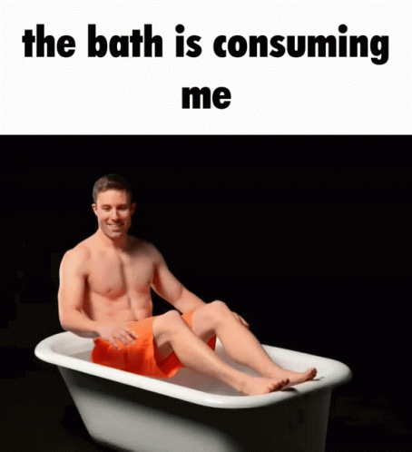 a man sits in a bath tub with the caption'the bath is consuming me '