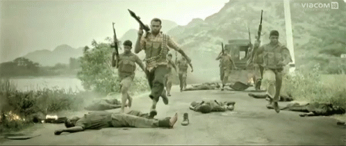 a group of soldiers are running with guns