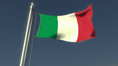 the flag of italy flies on a clear day