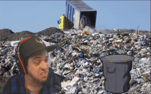a man looks at a pile of scrap