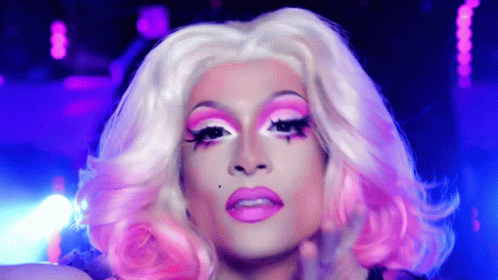 a blonde wig that has pink lips and white hair
