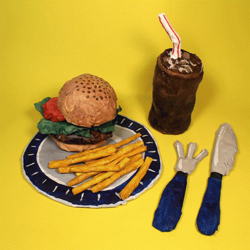 the hamburger and french fries on a plate