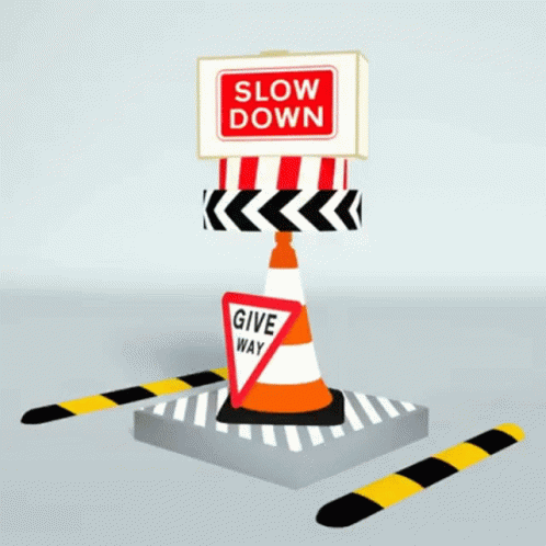 a traffic sign pointing towards slow down on the road