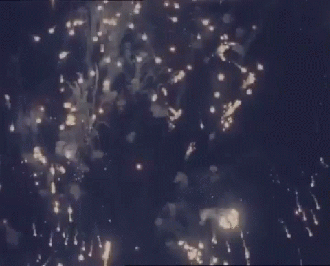 a big firework exploding out of the air with lots of smoke