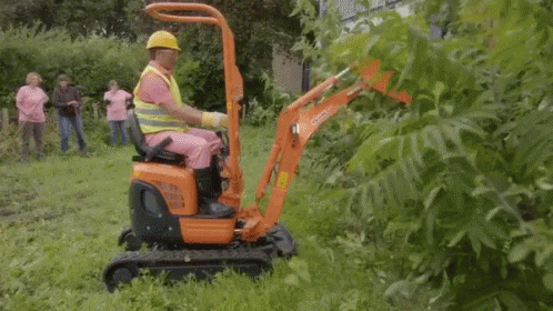 a person is sitting on a small machine