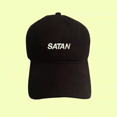 a black hat that says satan on it