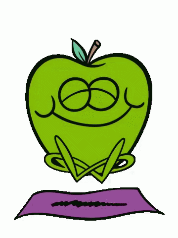 an apple sitting on top of an open book