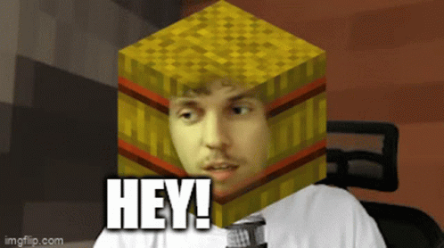 a man wearing a face with an image of a cube on his head