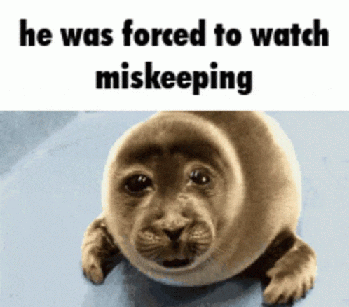 a blue seal pup that has the text he was forced to watch skiing